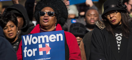 Supporters hold Hillary Clinton Campaign signs in January in Columbia, South Carolina. (photo: Sean Rayford/Getty)