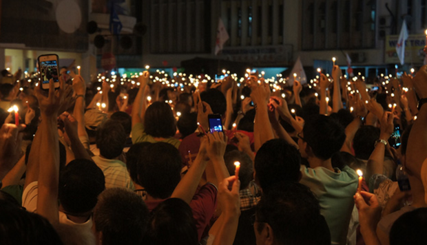 Candle Vigil via Shutterstock