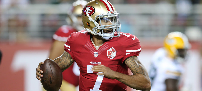 Kaepernick takes a stand by sitting