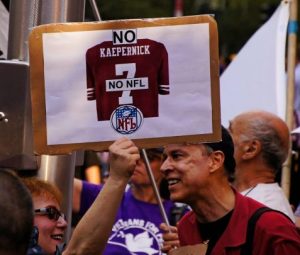 Standing with Colin Kaepernick - Photo By Bud Korotzer