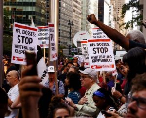 Standing with Colin Kaepernick - Photo By Bud Korotzer