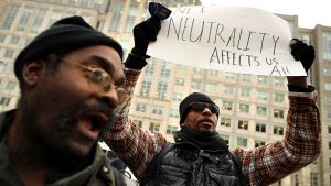 Demonstrators outside the FCC building in Washington. ‘The American people, not greedy corporations, should be in control of the internet