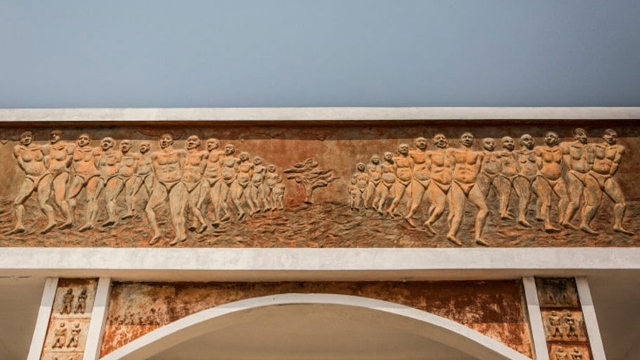 A detail of the Door of No Return, showing captured slaves on their way to the Americas.