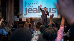 Ben Jealous talks to a crowd of people at local restaurant Busboys and Poets.