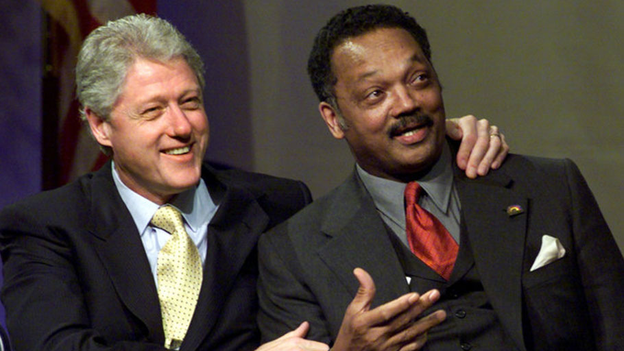 President Bill Clinton embraces Jesse Jackson at a Rainbow/Push Coalition event in New York City in 2000.