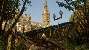 Students mill around the campus of Georgetown University.