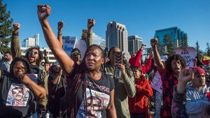 Veronica Curry and other Black Lives Matter activists and supporters during a rally on Interstate 5 in Sacramento, California, March 22, 2018