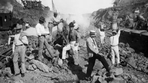 Work crew drilling through solid rock to create the Panama Canal, Panama, 1906.