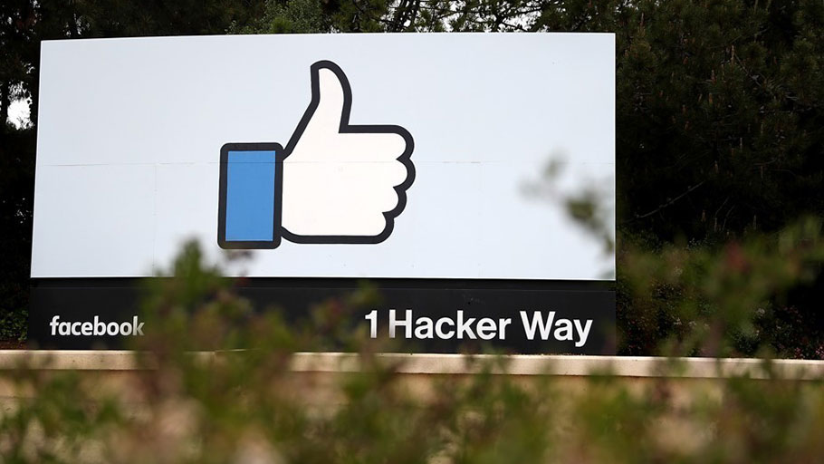 A sign outside Facebook headquarters in Menlo Park, California, during an April 5, 2018 demonstration staged by activist group 'Raging Grannies'