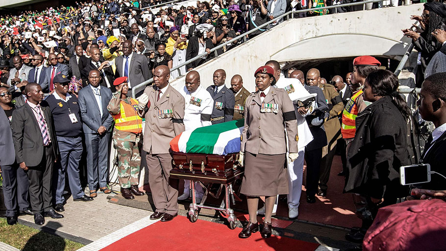 South African military personnel bring in the coffin at Orlando Stadium in Soweto for the funeral ceremony of Winnie Madikizela-Mandela.