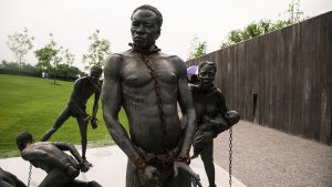 A sculpture of enslaved people at the entrance to the National Memorial for Peace and Justice.