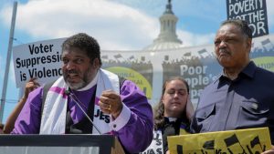 From left: The Rev. Wiliam Barber, the Rev. Liz Theoharis and the Rev. Jesse Jackson at a Poor People’s Campaign rally in Washington near the start of its six-week initiative on May 21. Jonathan Ernst, Reuters