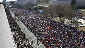 In this March 24, 2018 file photo, protesters fill Pennsylvania Avenue, as seen from the Newseum, during the “March for Our Lives” rally in support of gun control in Washington. Rachel Einwohner, a Purdue University sociology professor, says, “With the rise of social media, it’s definitely a lot easier for people to mobilize more quickly and you don’t necessarily need to have one charismatic leader like Dr. King, who had almost some kind of magical quality… But you still do need some powerful message that really resonates with a lot of people.”