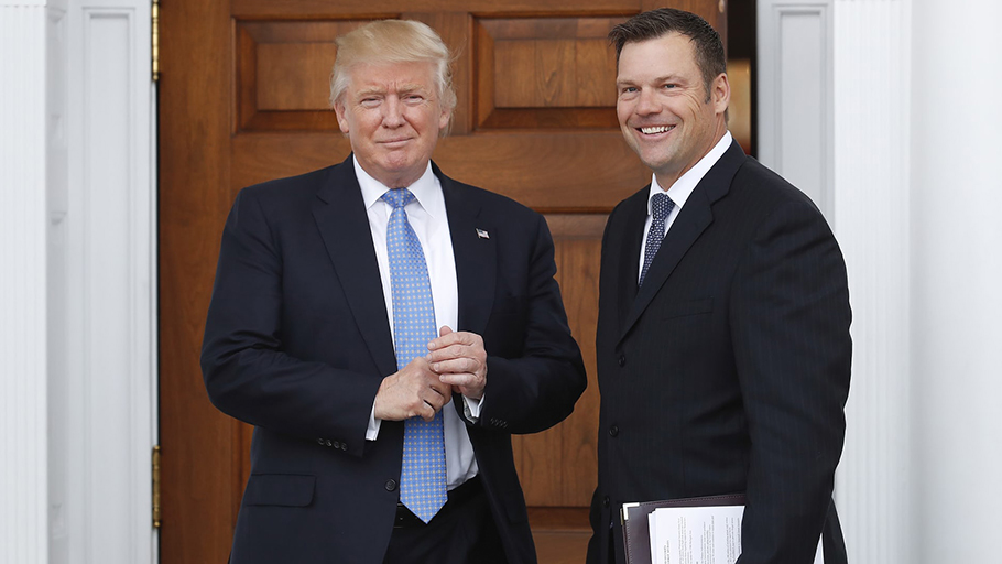 Donald Trump and Kris Kobach’s talk of voter fraud ‘is the lie used to justify voter suppression techniques’. Photograph: Carolyn Kaster/AP