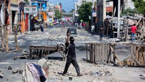 Protesters have set up road blocks to disrupt traffic and commerce along key streets in Port-au-Prince, Haiti’s capital. AP Photo/Dieu Nalio Chery