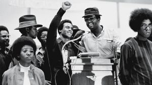 Huey Newton Speaks At Revolutionary People’s Party Constitutional Conventionin 1970. Photograph: David Fenton/Getty Images