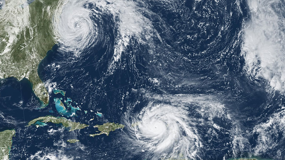 Hurricanes Katia (left), Irma (center) and Jose (right) in September 2017 – the first time on record that three major hurricanes made landfall at the same time in the Caribbean. Photograph: GOES-13 and MODIS/NASA/NOAA