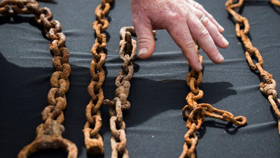 Chains discovered at the historic site where African-Americans forced into servitude after the Civil War were buried.