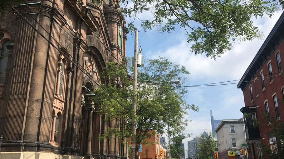 From the steps of St. Charles Borromeo at 20th and Christian, in the heart of the neighborhood, you can see the new Comcast tower and the Center City skyline.