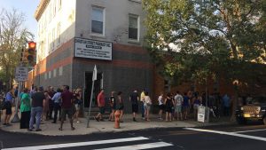 Graduate Hospital residents line up for a SOSNA meeting to discuss the plan for the recently demolished Chocolate Factory on Washington Avenue.