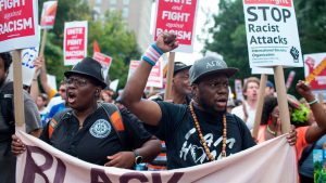 Antifa and counter protestors to a far-right rally march during the Unite the Right 2 Rally in Washington, DC, on August 12, 2018.