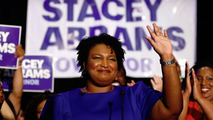 Democratic candidate for Georgia governor Stacey Abrams waves to supporters at an election-night party, May 22, 2018.