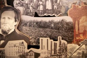 A display at the Sugar Land Heritage Museum and Visitor Center. At center, convicts harvesting sugar cane circa 1900.