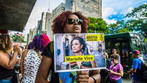 People gather in São Paulo on 14 April during a demonstration marking one month since Franco’s murder.