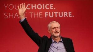 Jeremy Corbyn waves after making his inaugural speech at the Queen Elizabeth Centre in central London, Sept. 12, 2015.