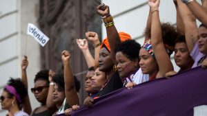 Black women in Brazil protest presidential frontrunner Jair Bolsonaro, who is known for his disparaging remarks about women, on Sept. 29, 2018.