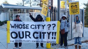 Protesters at the vehicular entrance to the Brooklyn Museum during the 2015 Brooklyn Real Estate Summit