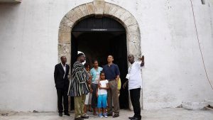 U.S. president Barack Obama, Michelle Obama and their daughters Malia and Sasha stand at the “Door of No Return” during their visit to the Cape Coast Castle, Ghana, July 11, 2009