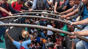 Depicted as a menacing horde … a caravan of Central Americans in Mexico, bound for the US.