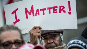 Faith leaders from communities throughout New York City lead a demonstration and prayer vigil on the steps of City Hall in protest to the Staten Island, New York grand jury's recent decision not to indict a police officer involved in the chokehold death of Eric Garner in July on December 12, 2014 in New York City.