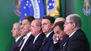 Evaristo Sa, AFP | Brazil's President Jair Bolsonaro (centre) pictured with some of his ministers in Brasilia on January 2, 2019.