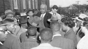 The Rev. William Holmes Borders (center), pictured in 1957. (AP Photo/HC)