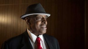 Melvin J. Fulton poses for a portrait inside the Cox Brothers Funeral Home on Auburn Avenue. Cox Brothers Funeral Home is Atlanta's oldest black-owned funeral home. Image by Evey Wilson