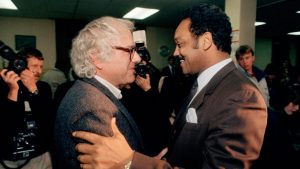 Sanders, the then-mayor of Burlington, Vermont, greets then-presidential candidate Jesse Jackson on Dec. 31, 1988. Supporters of Sanders’ 2020 White House bid value his long history of progressive stances.