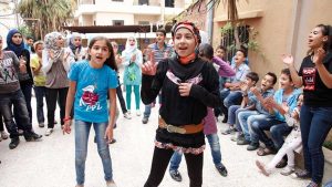 Dancing and singing to forget the pain of Syria's conflict