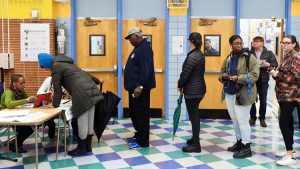 Voters register at a polling station in Manhattan, New York, on November 6, 2018.