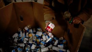 A woman shops for food at the St. Vincent de Paul food pantry in Indianapolis, Indiana.