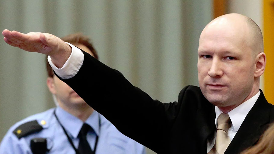 Anders Breivik, who killed 77 people in bomb and gun attacks in 2011. gestures as he enters a courtroom in Skien, Norway, on March 15, 2016.