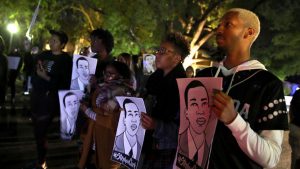 Black Lives Matter protesters march through the streets as they demonstrate the decision by Sacramento District Attorney to not charge the Sacramento police officers who shot and killed Stephon Clark last year, on March 4, 2019, in Sacramento, California.