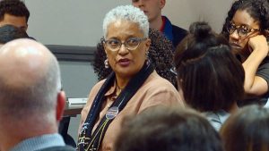 Melisande Short-Colomb, a sophomore and descendant of the 272 slaves sold at Georgetown University speaks at a town hall debate in support of the reparations referendum in Washington, April 3, 2019.