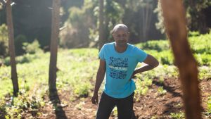 Garlic farmer Solomon Wambogo Munyua in his field in Embaringo, Kenya