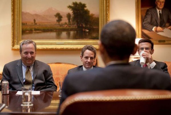 National Economic Council Director Larry Summers, Treasury Secretary Timothy Geithner, and Office of Management and Budget Director Peter Orszag look at President Barack Obama during an economic meeting in the Roosevelt Room of the White House, March 24, 2009.