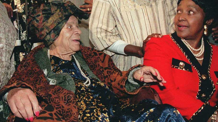 Winnie Madikizela-Mandela, right, and Kwame Ture, the activist formerly known as Stokely Carmichael, attend a tribute to civil rights leader and black nationalist Audley “Queen Mother” Moore, left, in 1996 in New York.