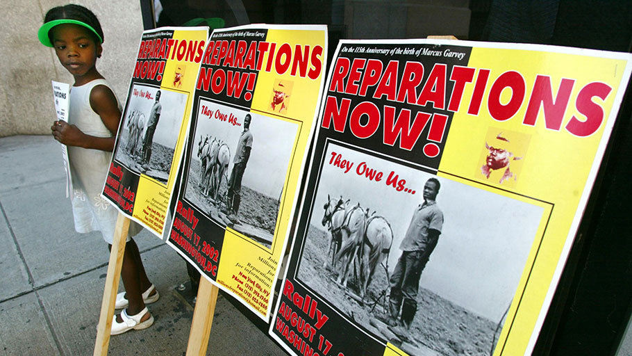 Lindi Bobb, 6, attends a slavery reparations protest on August 9, 2002 in New York City. On June 19, 2019, the House Judiciary Committee held hearings on legislation proposing the establishment of a commission to study reparations.