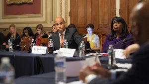 U.S. Sen. Cory Booker of New Jersey is among the 2020 Democratic presidential candidates who've traveled to the South to talk about voting rights. In this 2016 photo, Booker is seen discussing voting rights at the U.S. Capitol with Rep. Terri Sewell of Alabama and civil rights icon Rep. John Lewis of Georgia.