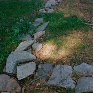 Rocks mark the location of the original house foundation at Highland.